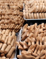 Trays of dog biscuits made in a dog bakery business